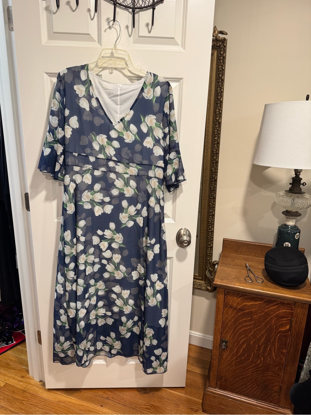 Ladies lightweight lined sheer dress.